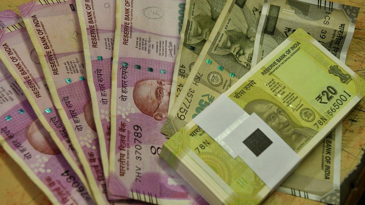 Rupee settles 3 paise lower at 83.82 against U.S. dollar in range-bound trade